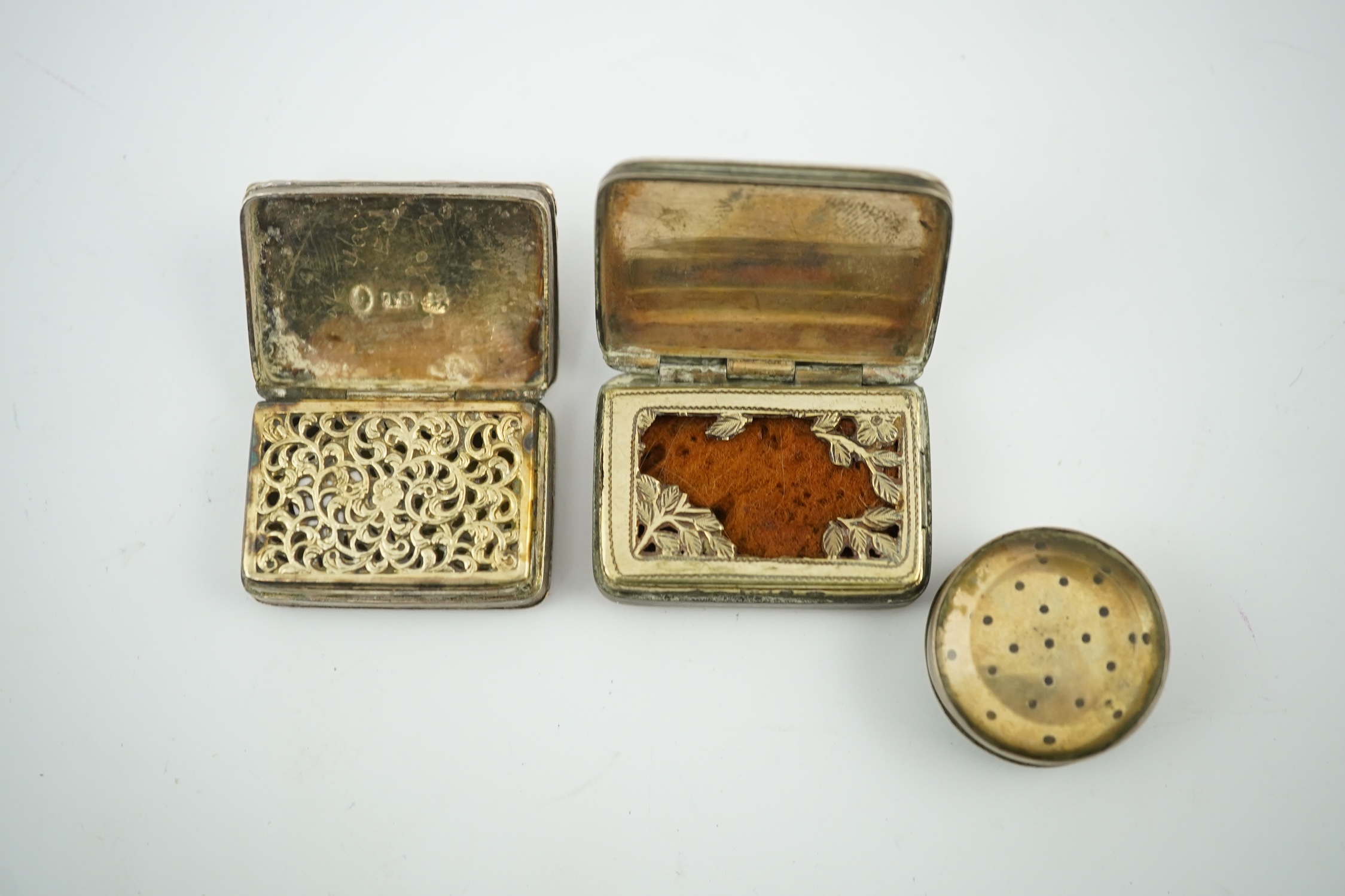 A William IV silver rectangular vinaigrette, William Stroud, Birmingham, 1833, 30mm and two other vinaigrettes. Condition - poor to fair